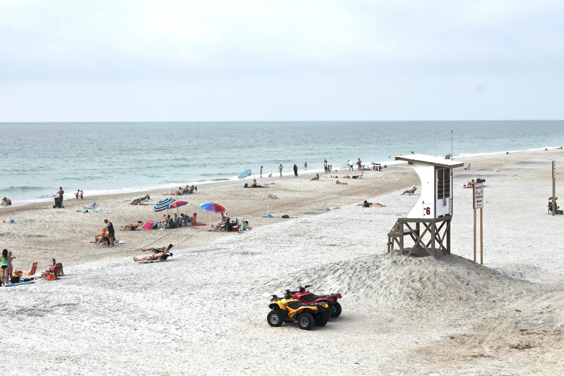 A beach lifeguard station beside the ocean